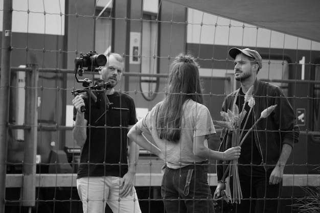 A behind-the-scenes shot of the film crew during the filming of [Movie Title]'s ending, capturing the actors, director, and crew involved in crafting this momentous scene.