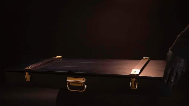 A mysterious, glowing briefcase is seen from a low angle, casting an eerie light on surrounding figures in a dimly lit warehouse. The faces are partially obscured by shadows, enhancing the suspense and secrecy surrounding the briefcase's contents.