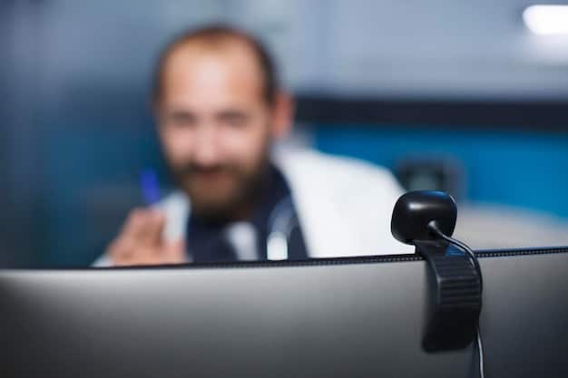 A close-up shot of a debate moderator, looking attentively at the candidates. The background is blurred, emphasizing the moderator's role.
