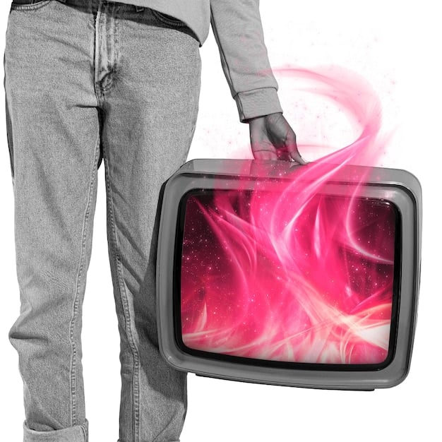 A person holding a remote control, pointing it towards a television screen. The screen shows a breaking news alert with exaggerated graphics.