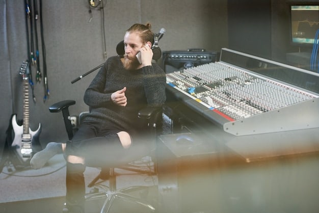 A sound designer in a professional studio, surrounded by mixing boards and sound equipment, deeply focused on their work.