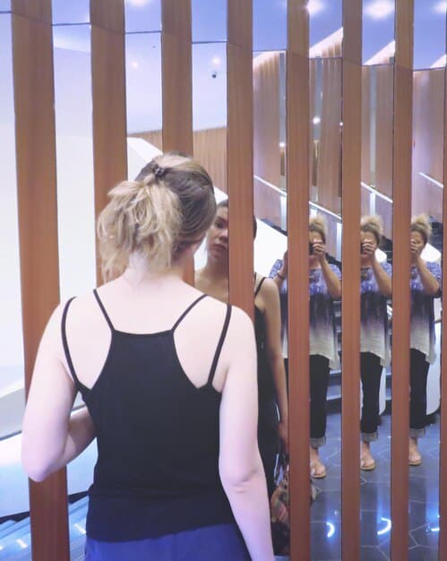 A behind-the-scenes photo showing the choreographer in discussion with the director about the narrative intentions of a dance sequence, highlighting the collaborative process.